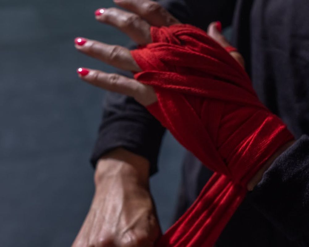 Close up of sports equipment and athlete hands